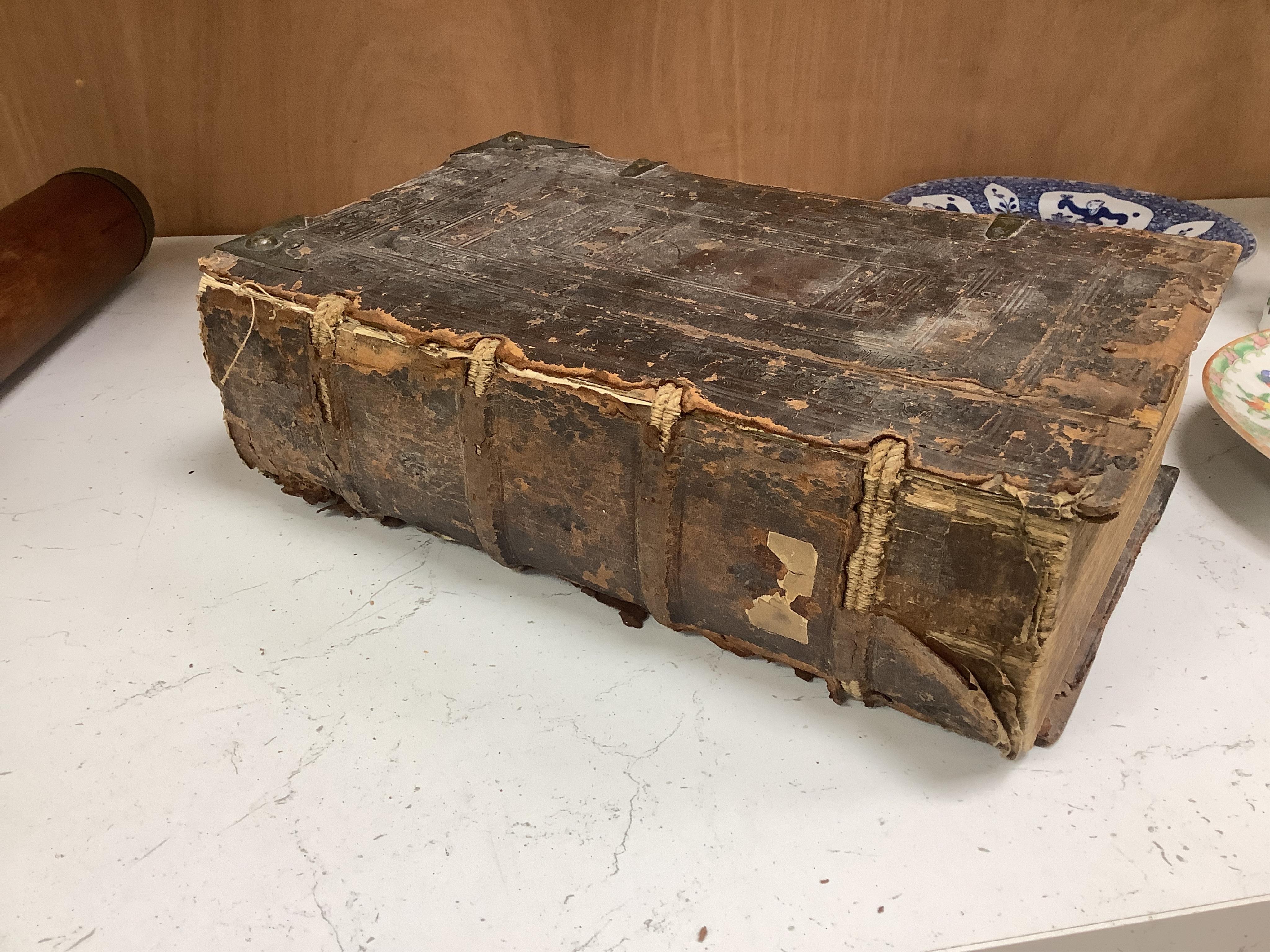 A 16th century German bible with embossed leather binding. Condition - poor
